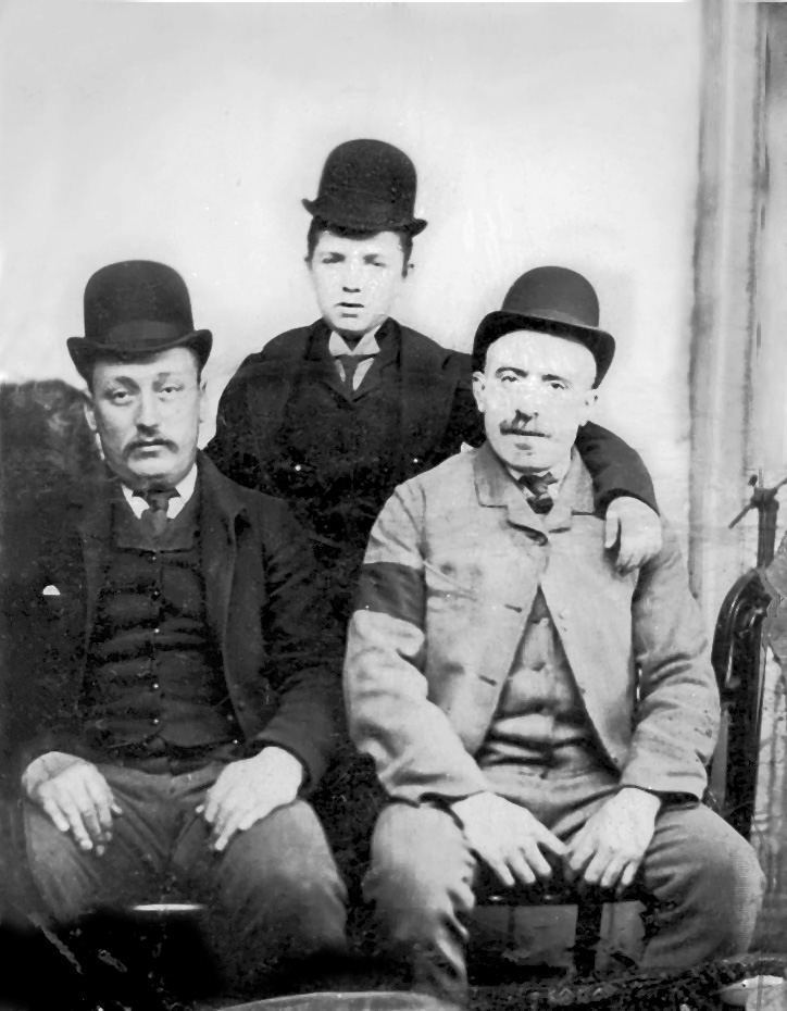 Alfred Tiffany is seated on the right, his son George is in the center.<br>Not sure who the other person is.<br>Alfred is in mourning (see black armband) for his wife. (circa 1892)