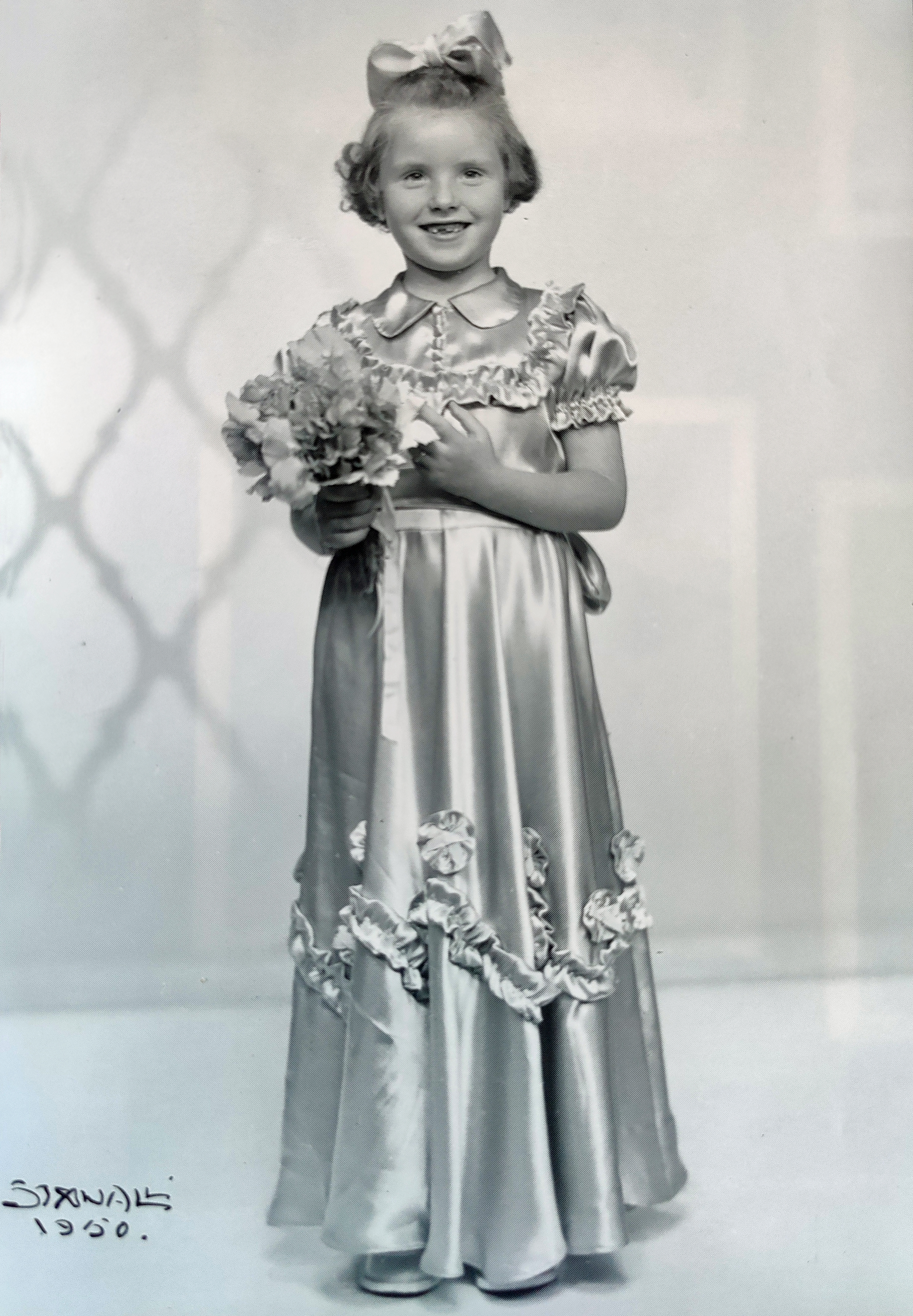 Lise wearing the bridesmaid dress Olga made for her (1950)
